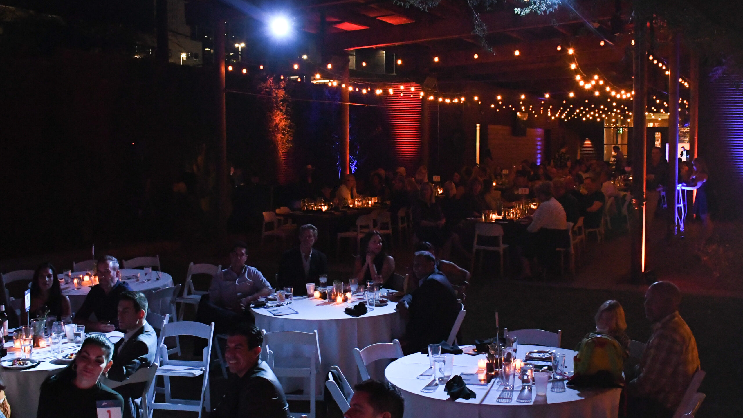 party attendees sitting at their tables