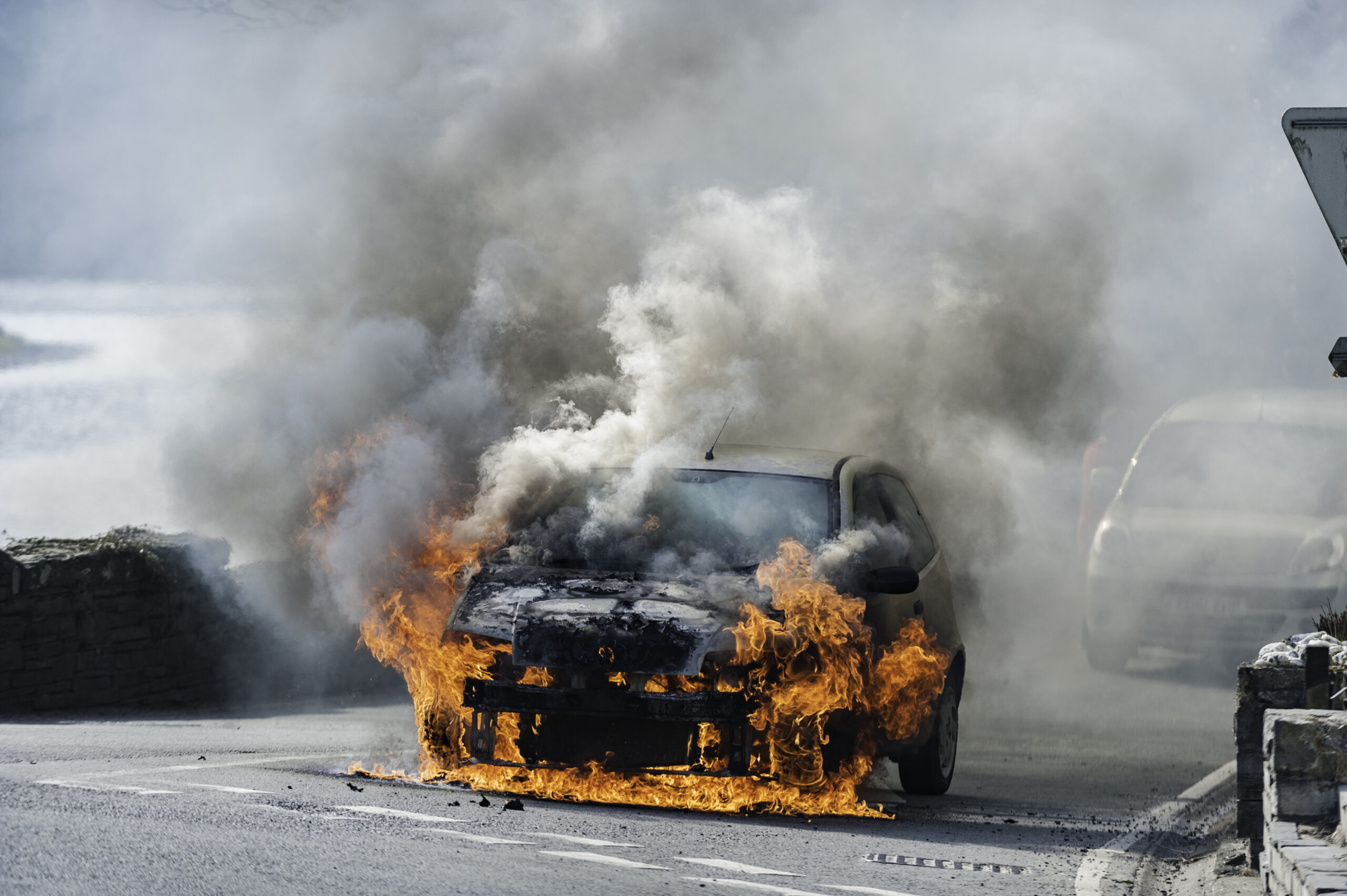 car in flames on highway
